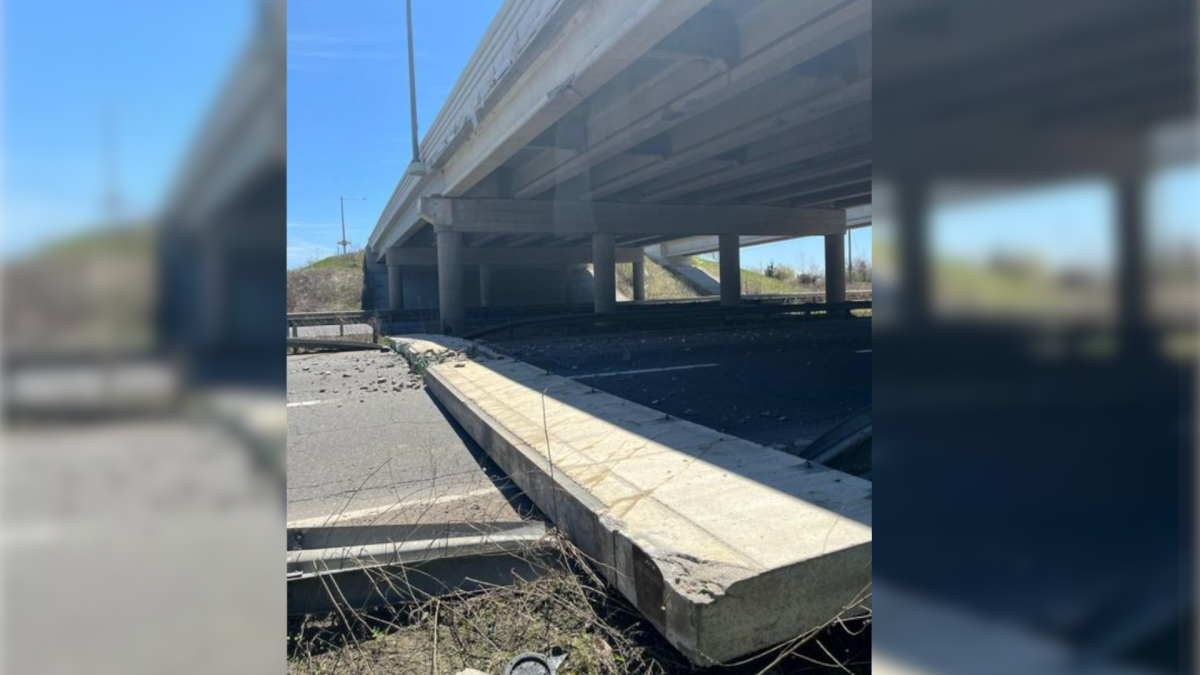 Concrete slab falls from bridge over 403